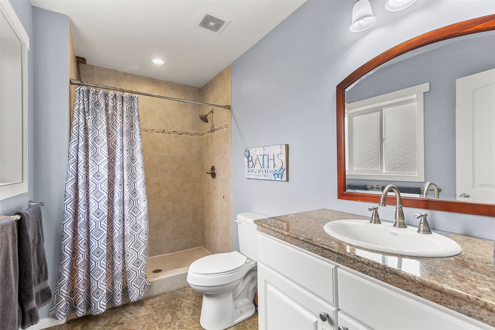485 High Creek Road Fairplay, CO 80440 - Photo 18 of 32 Bathroom with vanity, a tile shower, and recessed lighting