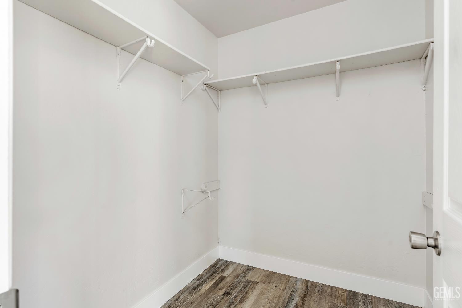 Undisclosed Address Weldon, CA 93283 - Photo 21 of 48 a view of walk in closet with empty racks