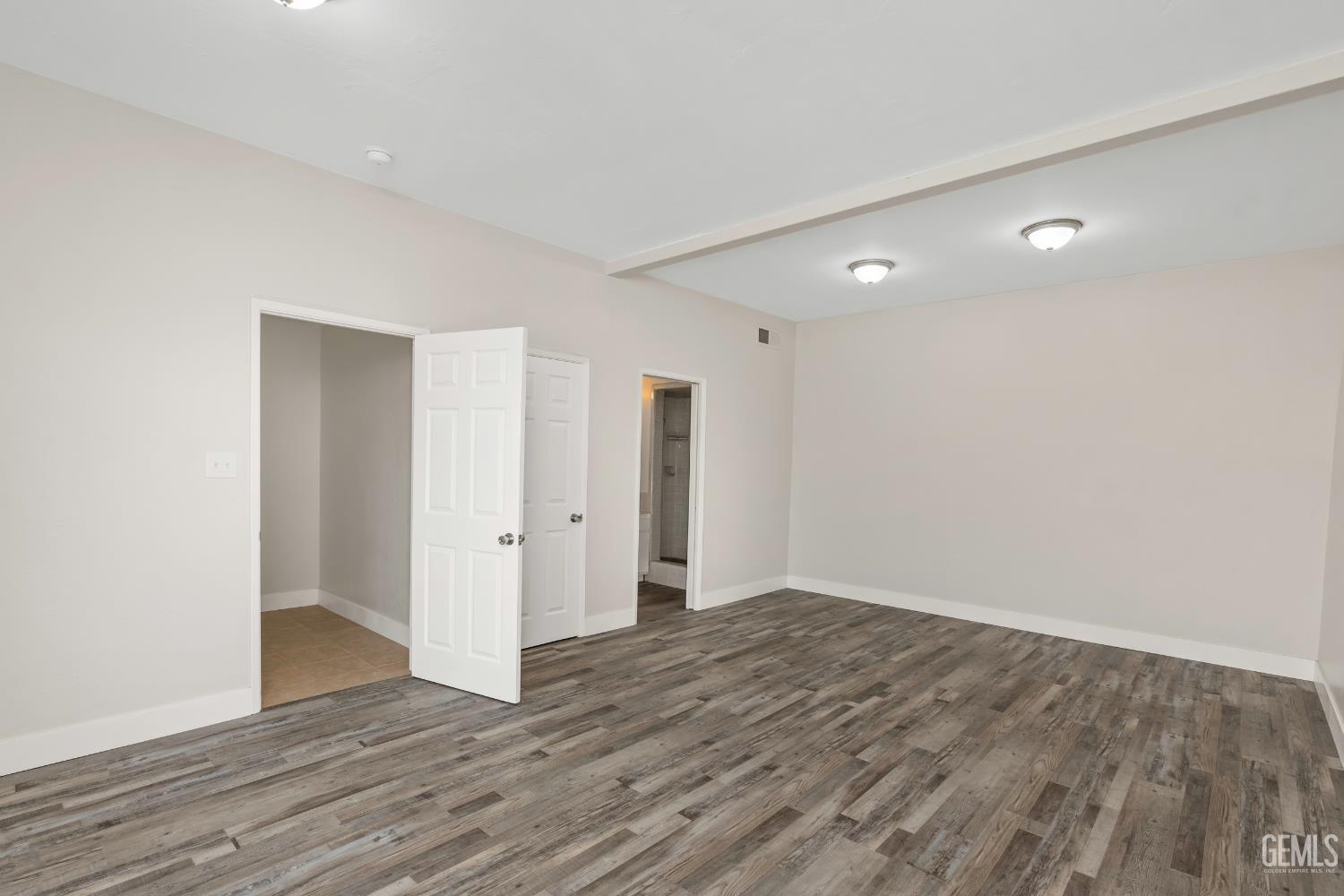 Undisclosed Address Weldon, CA 93283 - Photo 26 of 48 a view of an empty room with wooden floor