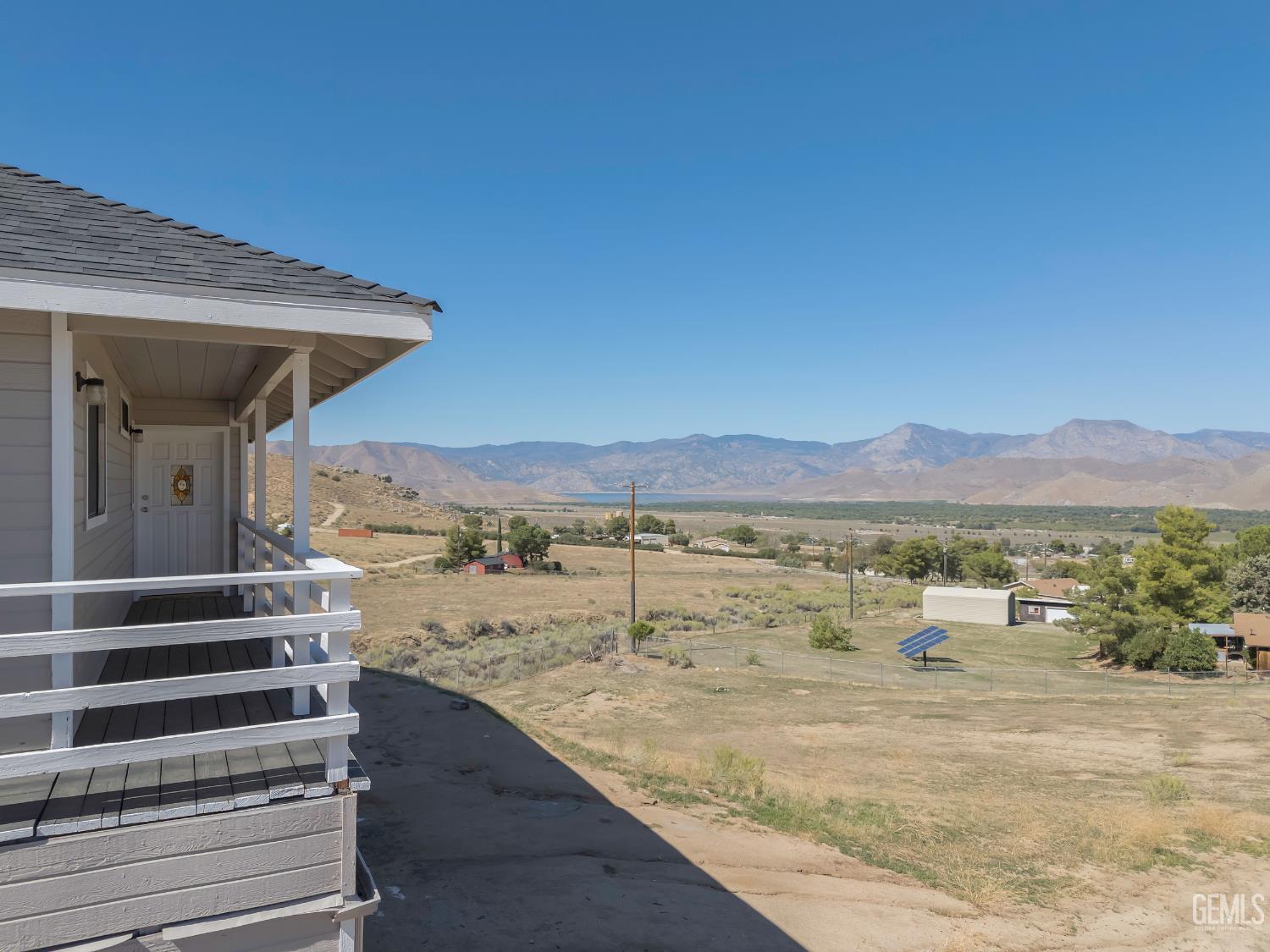 Undisclosed Address Weldon, CA 93283 - Photo 29 of 48 a view of a terrace with wooden floor and mountain view