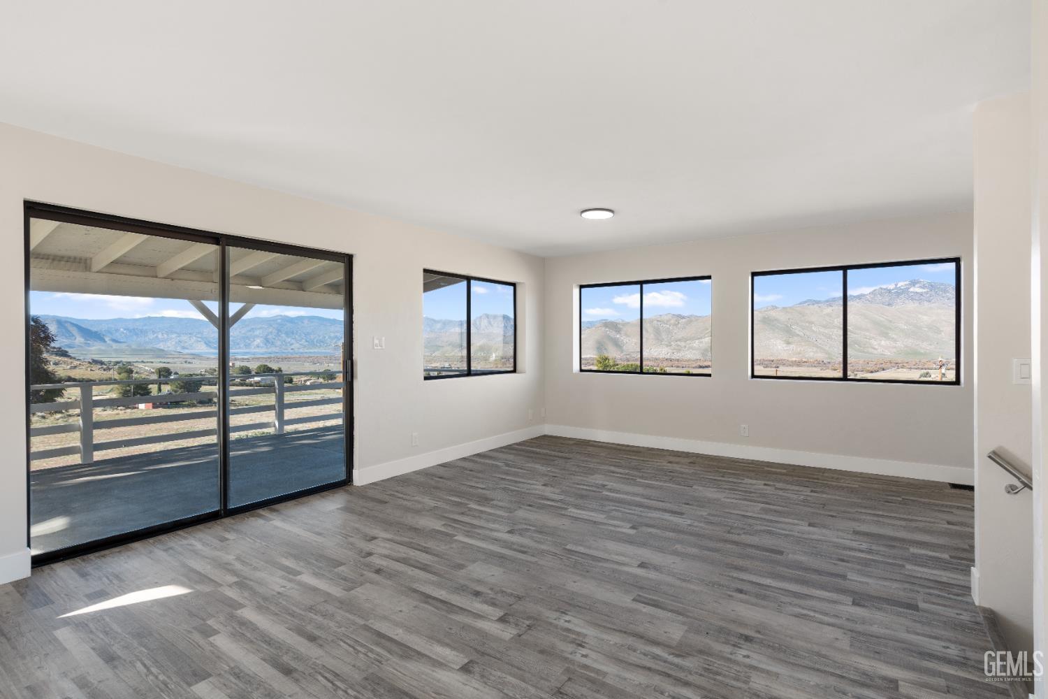 Undisclosed Address Weldon, CA 93283 - Photo 38 of 48 wooden floor in an empty room with a window