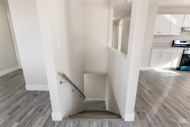 a view of a kitchen from the hallway