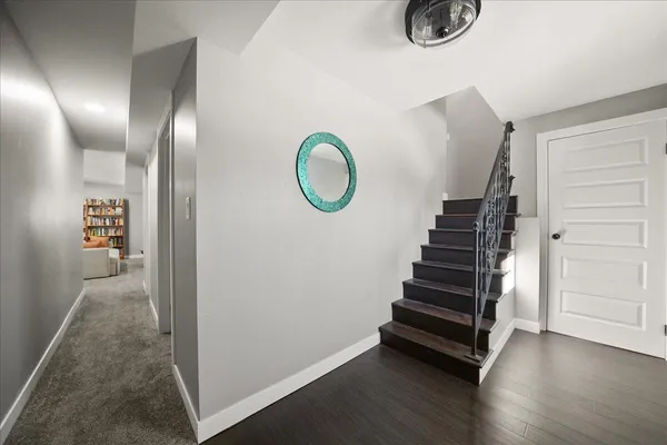 a view of entryway with wooden floor