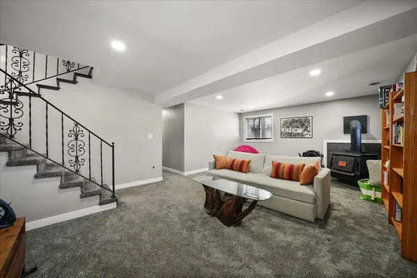 a bed room with furniture and stairs