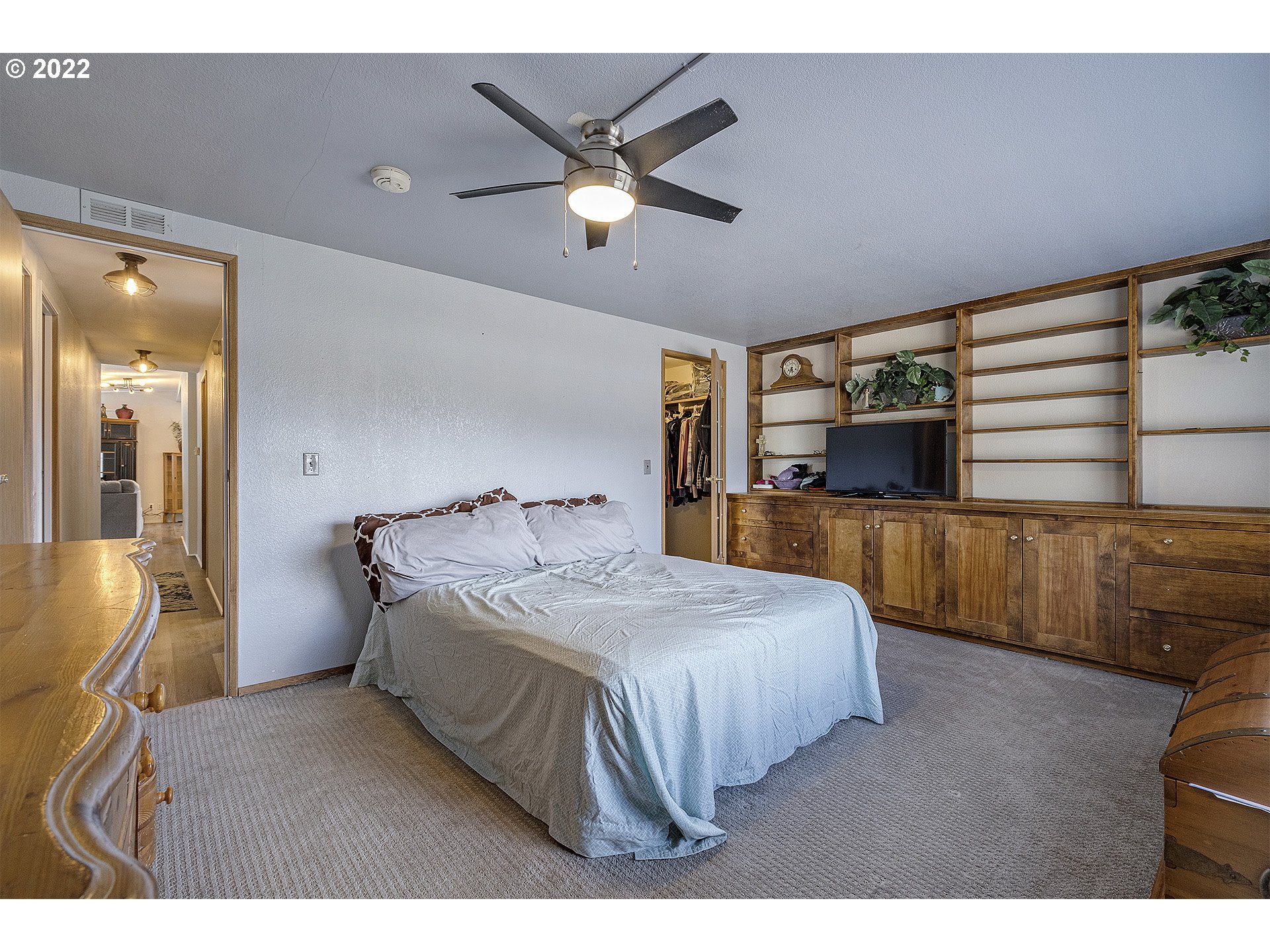 31934 Highland Road Rainier, OR 97048 - Photo 13 of 27 a bedroom with a bed and a flat screen tv