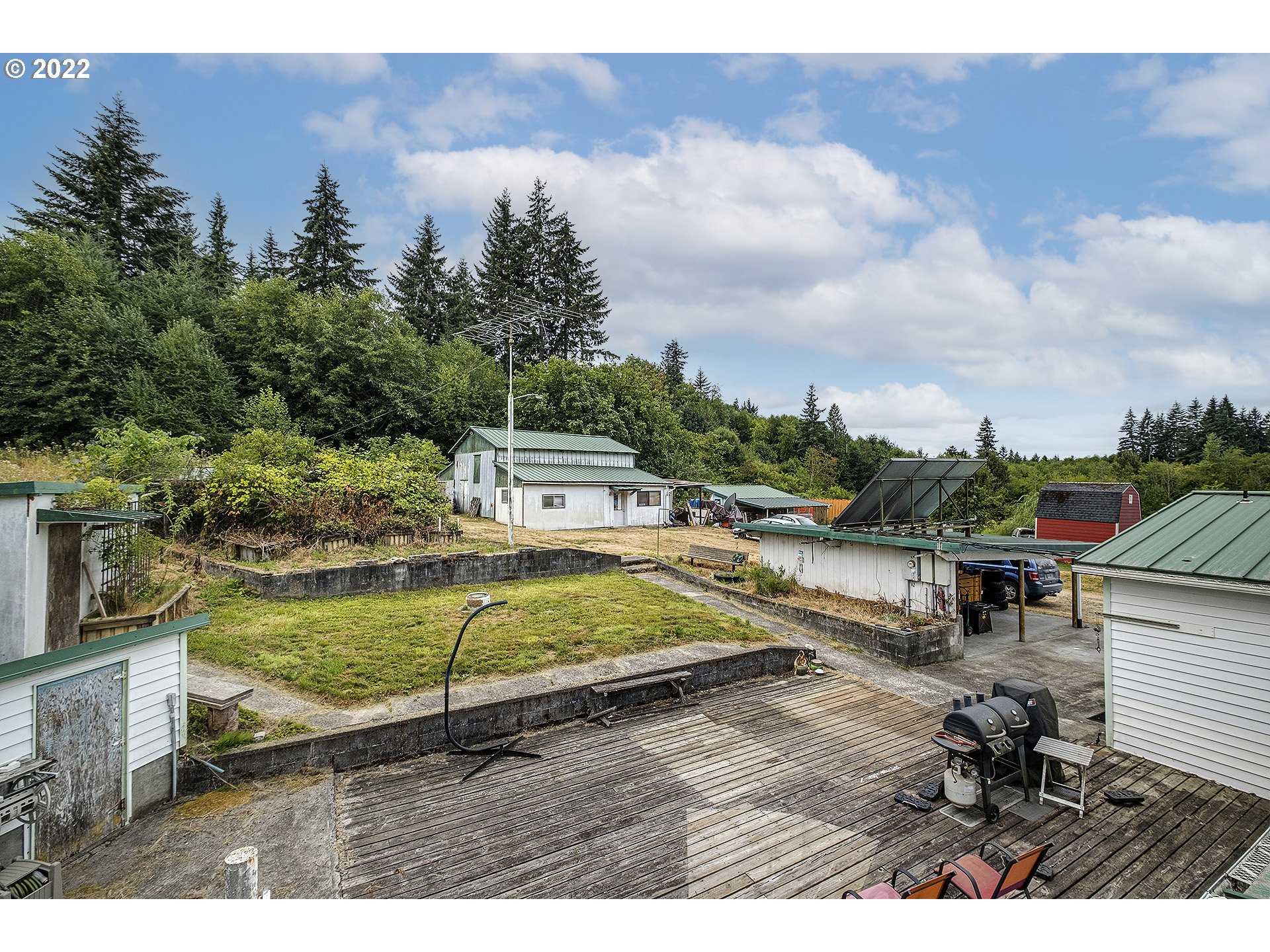 31934 Highland Road Rainier, OR 97048 - Photo 27 of 27 a view of a swimming pool with a patio