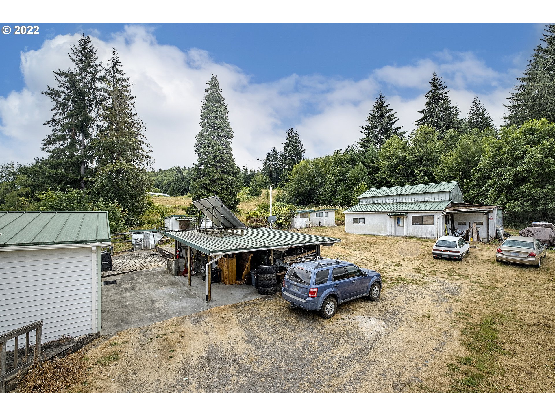 31934 Highland Road Rainier, OR 97048 - Photo 23 of 27 a view of a backyard with sitting area