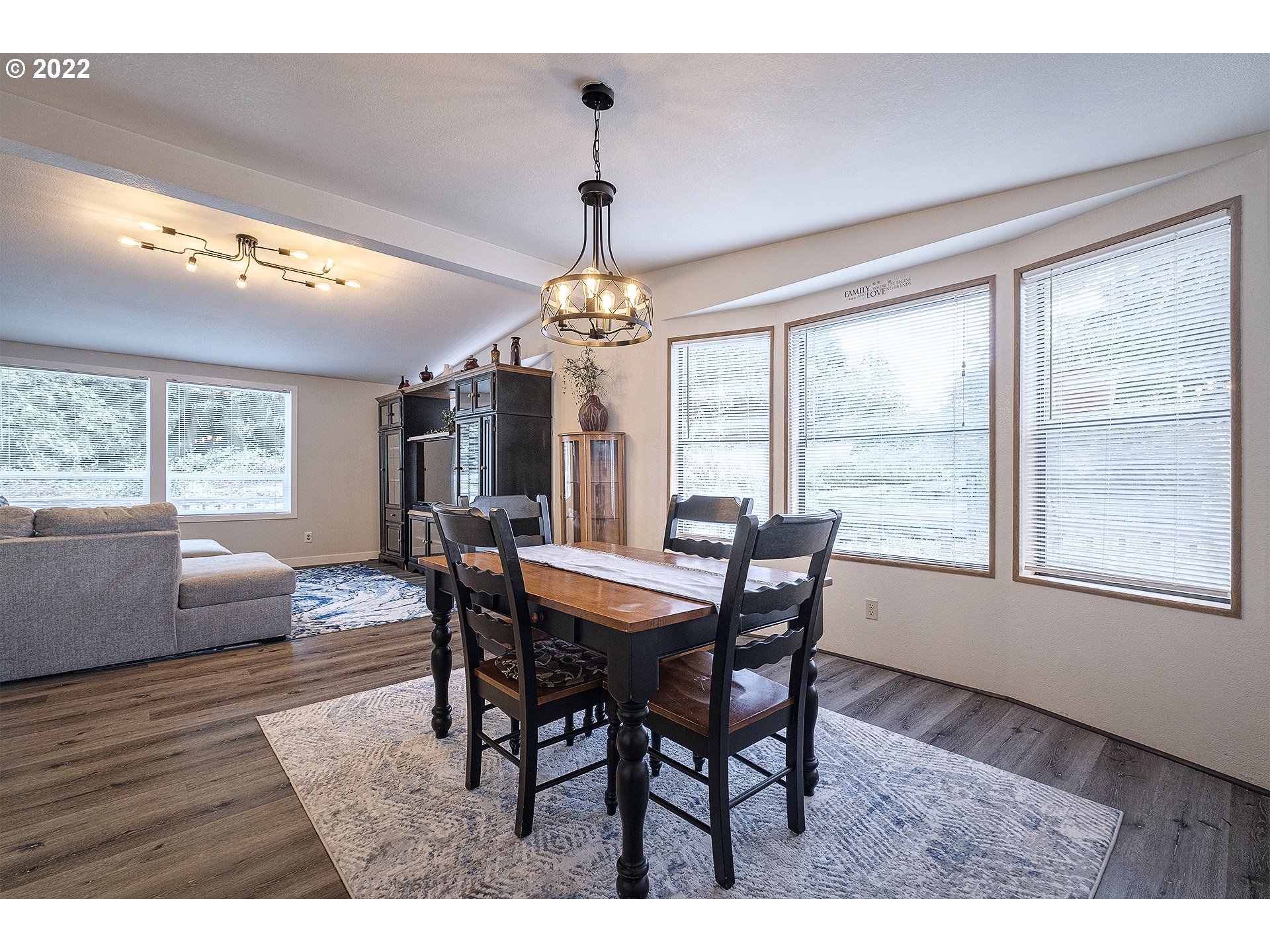 31934 Highland Road Rainier, OR 97048 - Photo 7 of 27 a view of a dining room with furniture window and wooden floor