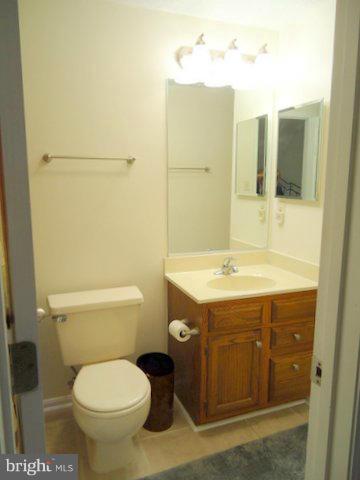 13928 Winding Ridge Lane Centreville, VA 20121 - Photo 19 of 29 a bathroom with a sink toilet and shower