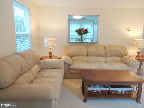 13928 Winding Ridge Lane Centreville, VA 20121 - Photo 3 of 29 a living room with furniture and a window