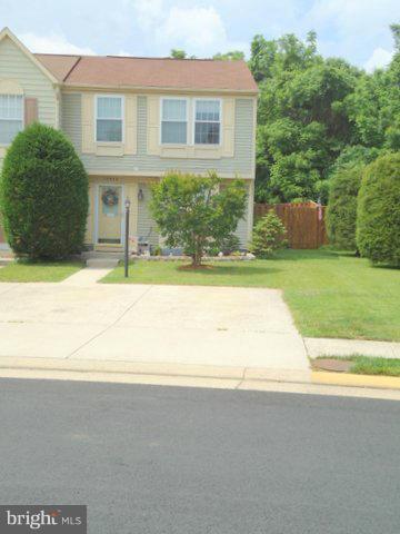 13928 Winding Ridge Lane Centreville, VA 20121 - Photo 28 of 29 a view of a house with a yard and sitting area