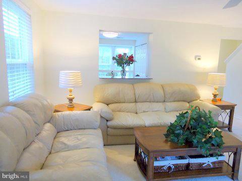 13928 Winding Ridge Lane Centreville, VA 20121 - Photo 5 of 29 a living room with furniture and a couch