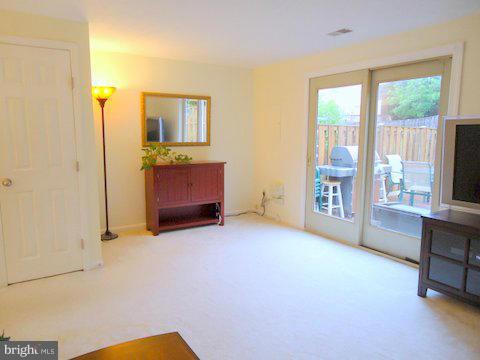 13928 Winding Ridge Lane Centreville, VA 20121 - Photo 6 of 29 a view of an empty room with a window