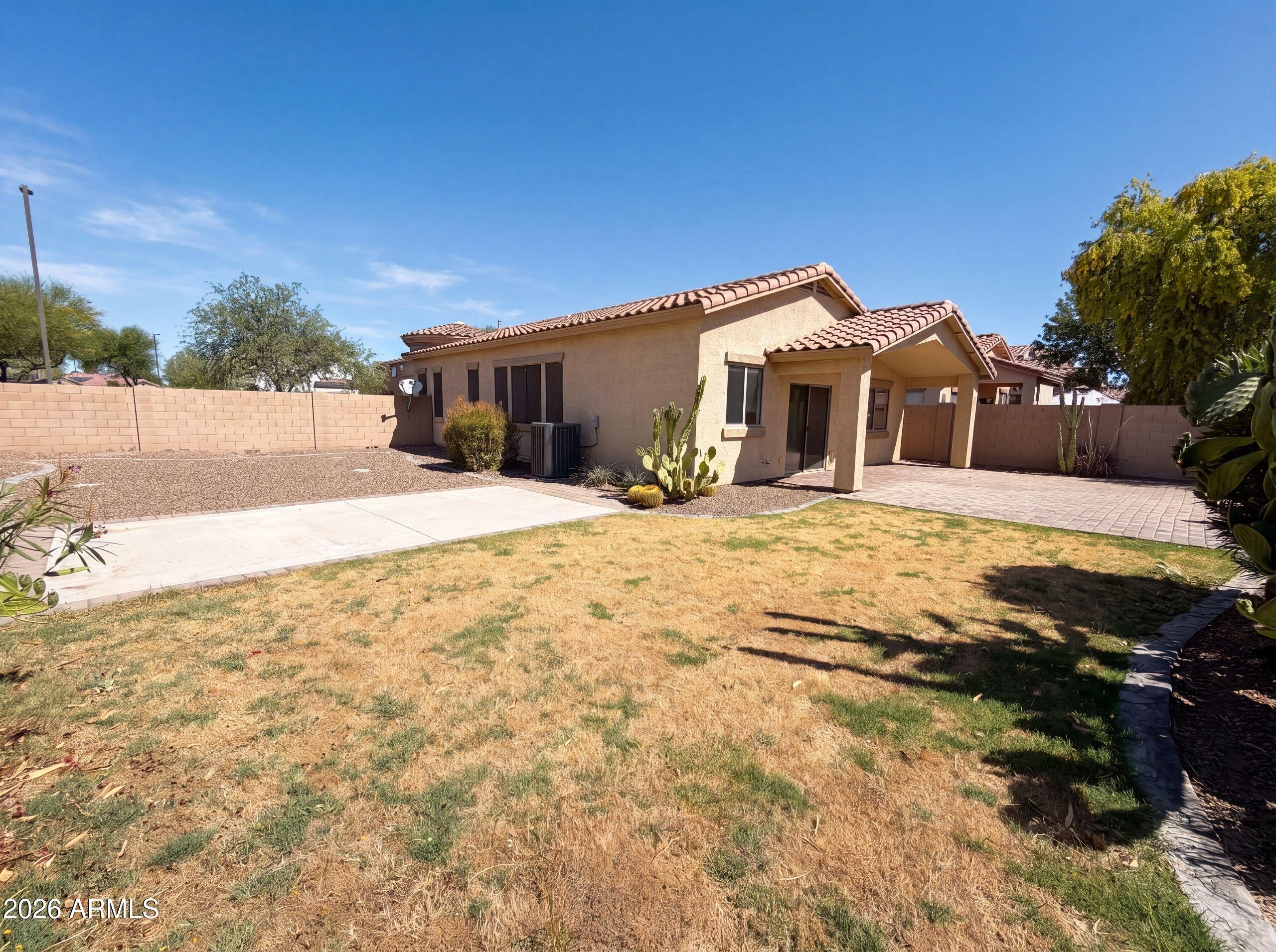3951 East Timberline Road Gilbert, AZ 85297 - Photo 28 of 28 a view of a house with a yard