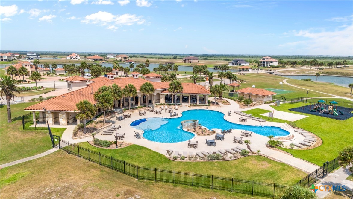 an aerial view of a house with outdoor space