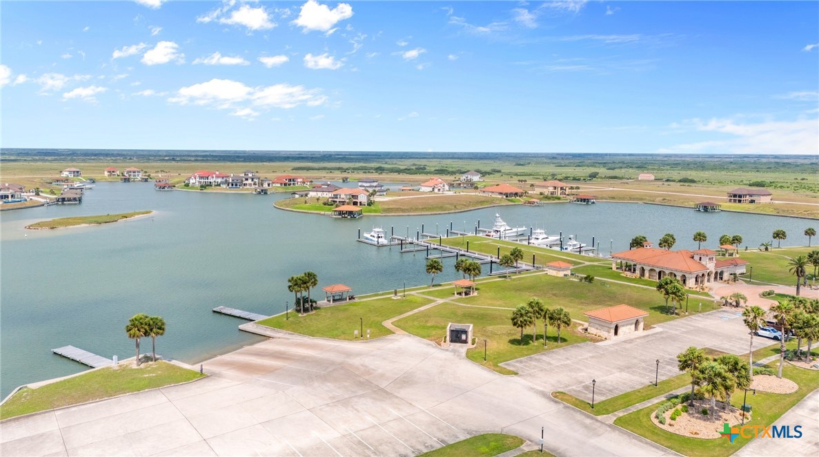 L272 East Lago Loop Road Port O'Connor, TX 77982 - Photo 7 of 11 a view of a swimming pool and an ocean view