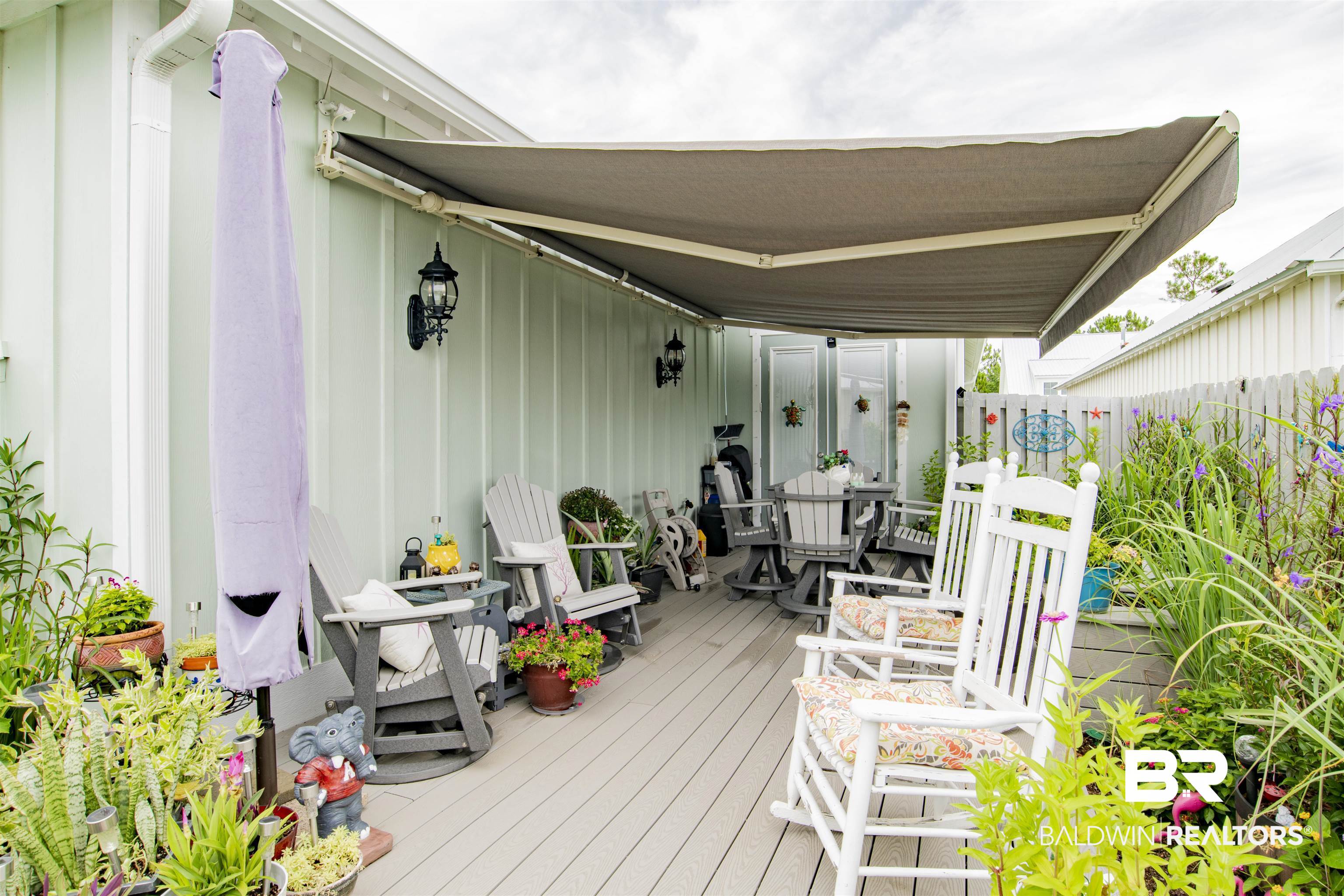 4845 Cypress Loop Orange Beach, AL 36561 - Photo 25 of 37 Composite decking with sunsetter awning
