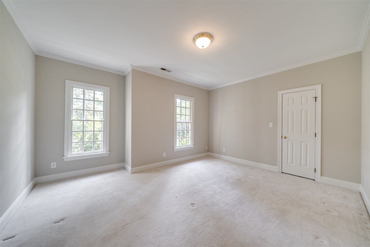 209 Claflin Court Raleigh, NC 27614 - Photo 19 of 30 Large upstairs bedroom with beautiful view of your yard. Bedroom