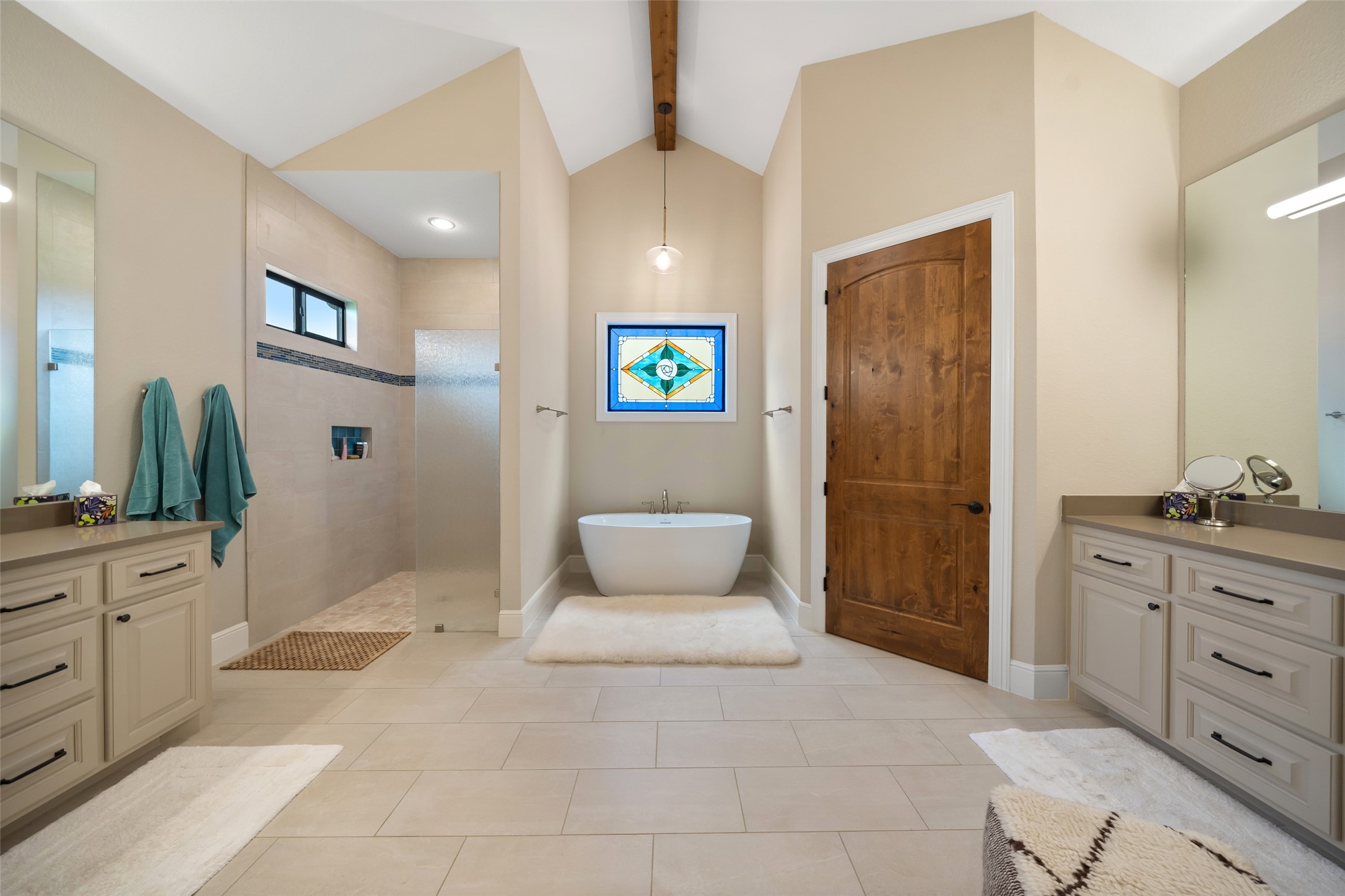 30163 High Spirit Ranch Road Hempstead, TX 77445 - Photo 25 of 49 a spacious bathroom with a double vanity sink and a mirror