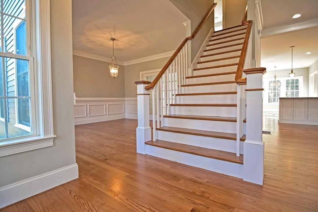 115 High Street Medfield, MA 02052 - Photo 12 of 42 a view of entryway and hall with wooden floor