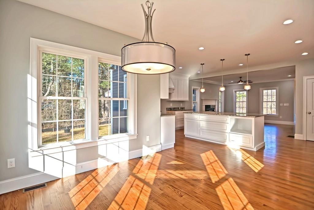 115 High Street Medfield, MA 02052 - Photo 21 of 42 a view of a kitchen with granite countertop lots of counter top space and stainless steel appliances