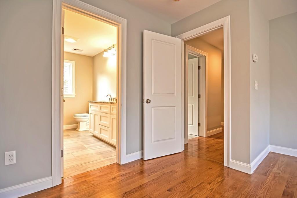 115 High Street Medfield, MA 02052 - Photo 34 of 42 a view of a bathroom from a hallway