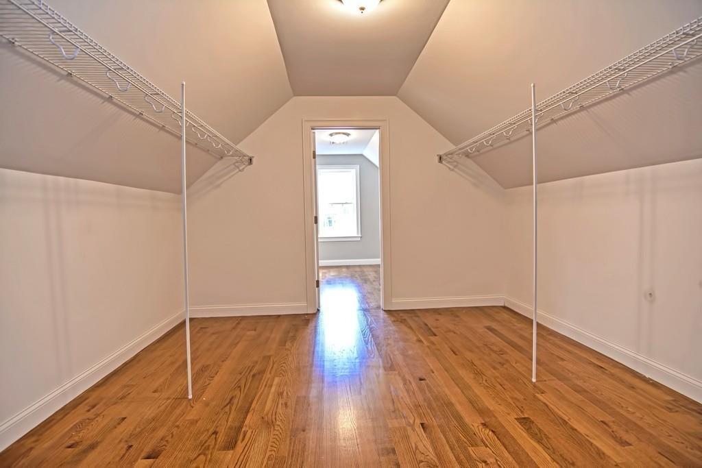 115 High Street Medfield, MA 02052 - Photo 37 of 42 a view of a room with wooden floor and white walls