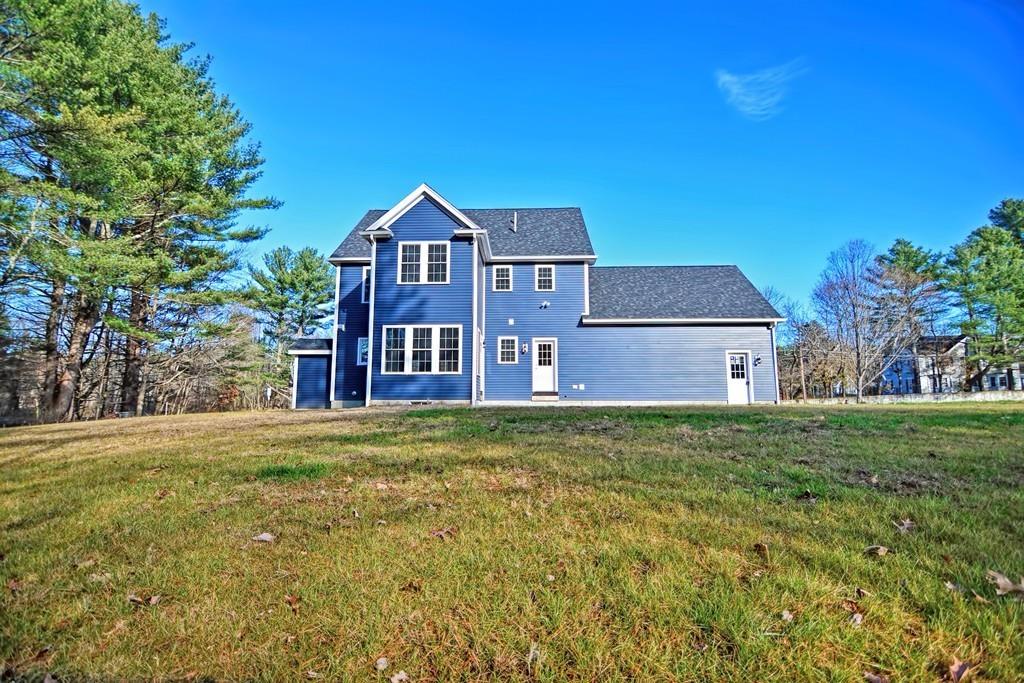 115 High Street Medfield, MA 02052 - Photo 40 of 42 a front view of a house with a yard