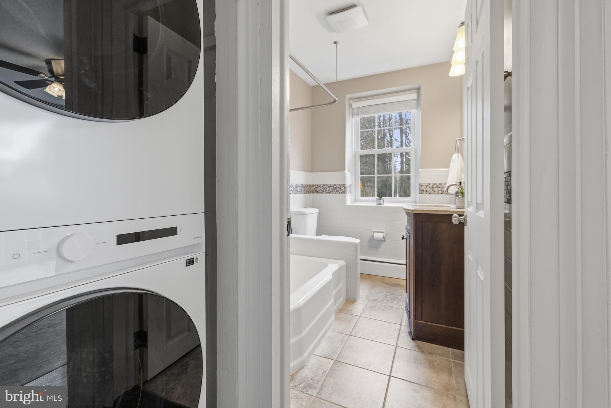1405 Church Road Wyncote, PA 19095 - Photo 21 of 38 a hallway with a washer and dryer