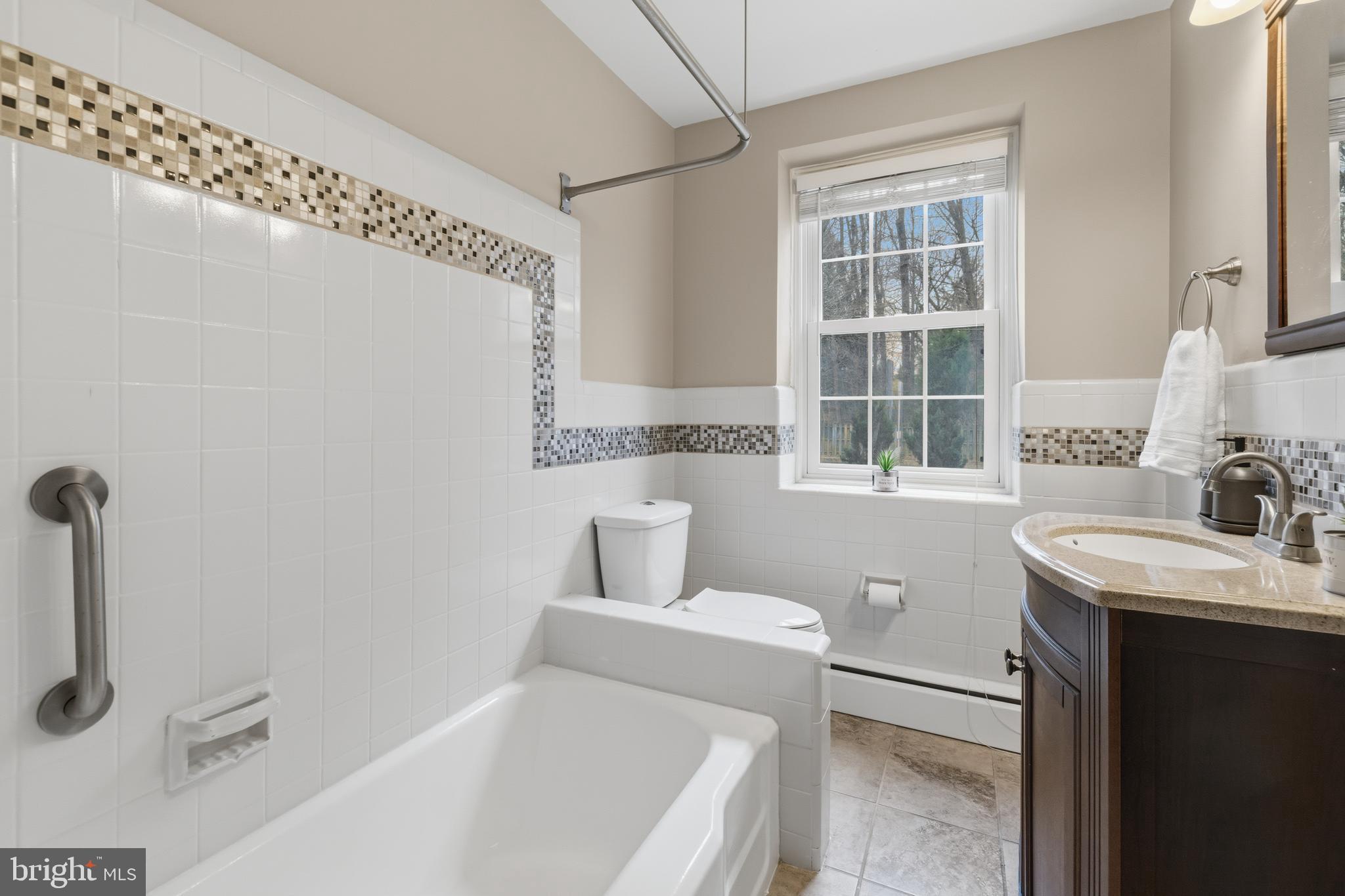 1405 Church Road Wyncote, PA 19095 - Photo 22 of 38 a bathroom with a sink toilet and shower
