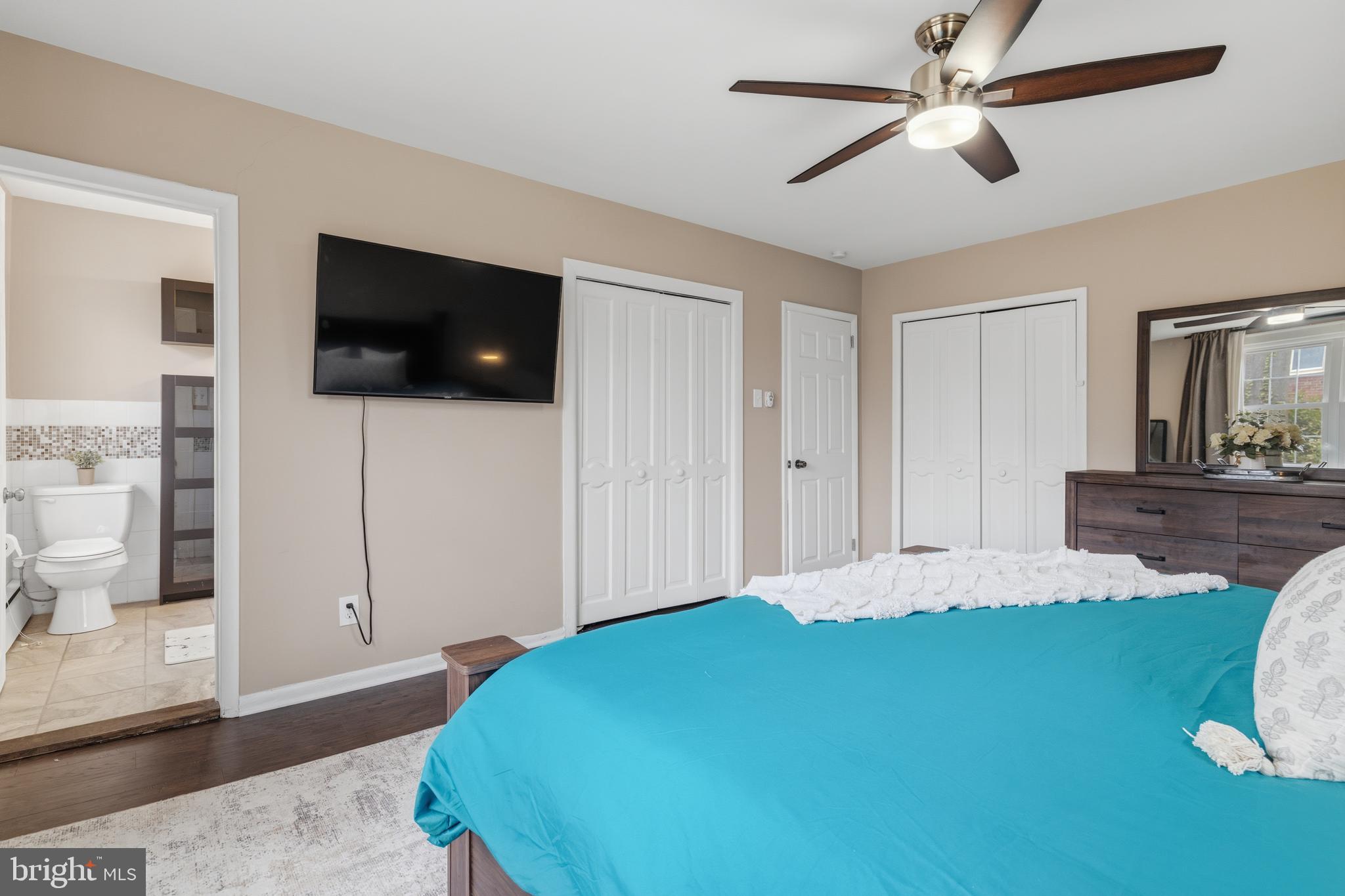 1405 Church Road Wyncote, PA 19095 - Photo 24 of 38 a bedroom with a bed and a flat screen tv