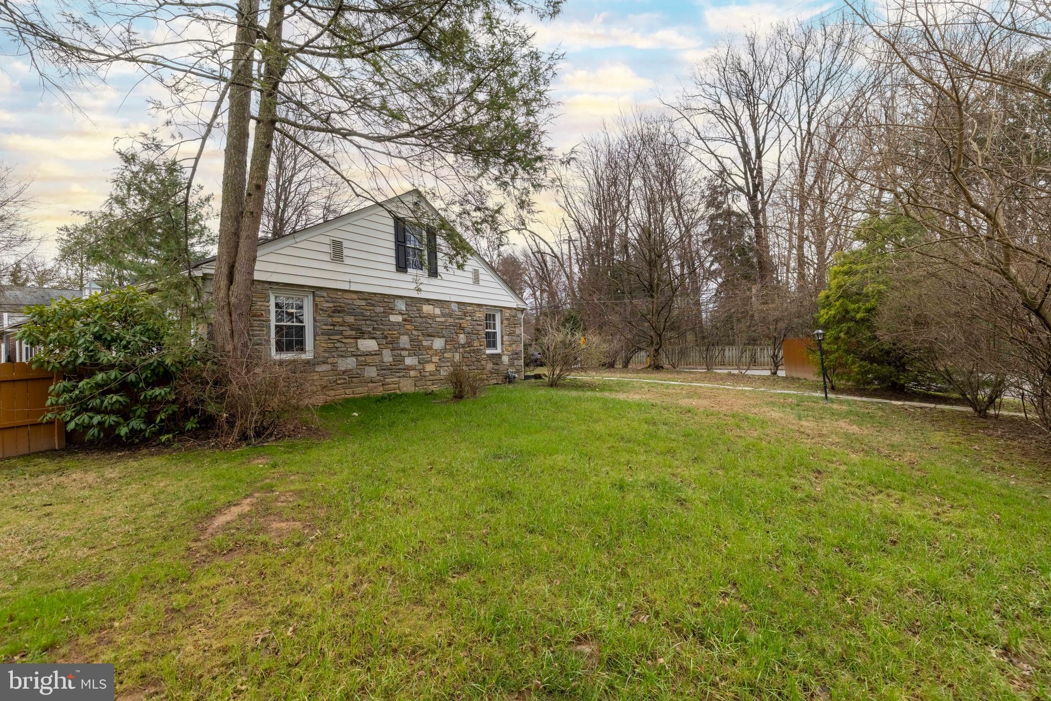 1405 Church Road Wyncote, PA 19095 - Photo 36 of 38 a front view of a house with garden