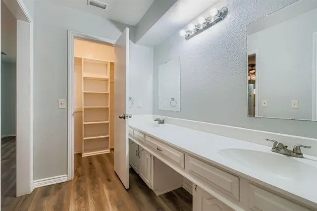 a hallway with washer and dryer