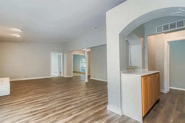 a view of a kitchen from the hallway