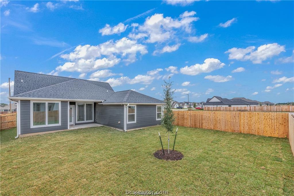 3161 Tarleton Court Bryan, TX 77808 - Photo 21 of 23 a front view of a house with a yard