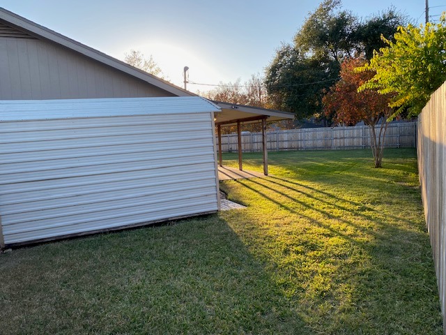 1002 Creekbend Cove Pflugerville, TX 78660 - Photo 4 of 16 Fenced yard featuring a patio
