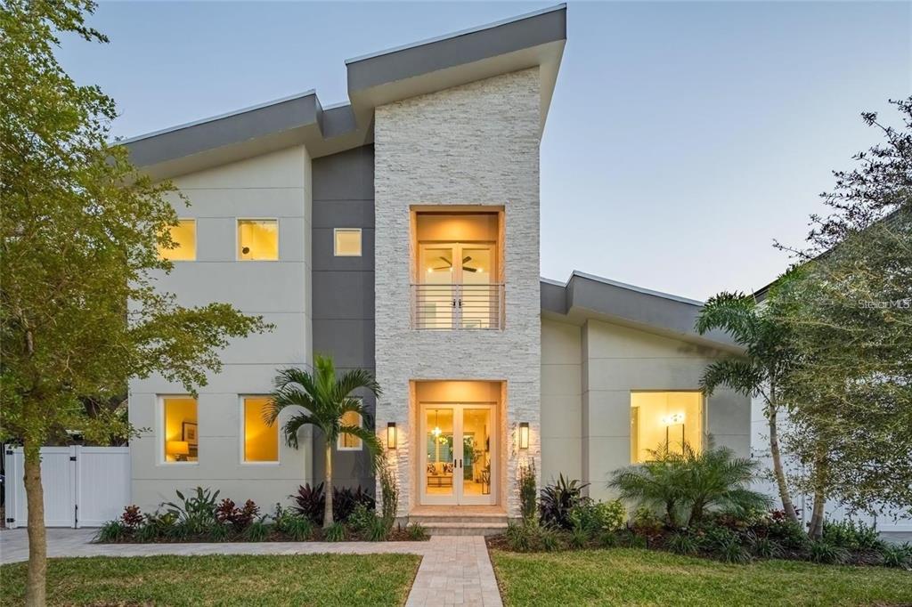 2446 Floyd Street Sarasota, FL 34239 - Photo 2 of 70 a front view of a house having yard
