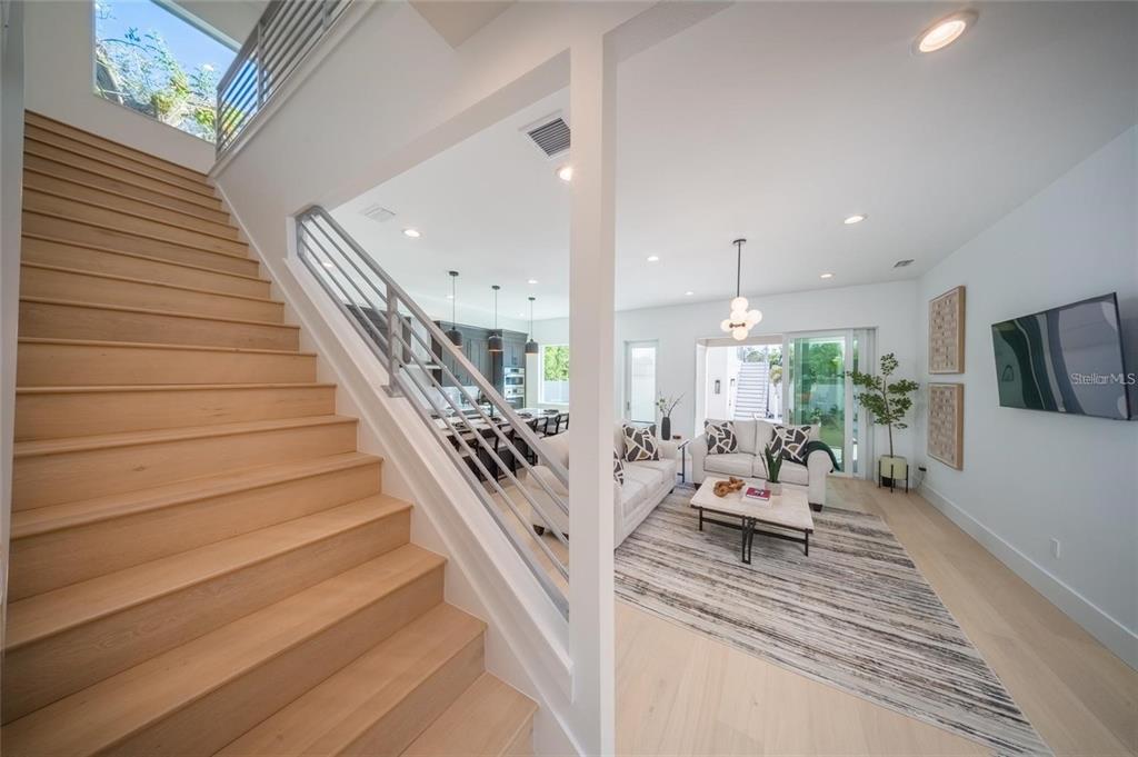 2446 Floyd Street Sarasota, FL 34239 - Photo 33 of 70 a view of entryway and hall with wooden floor