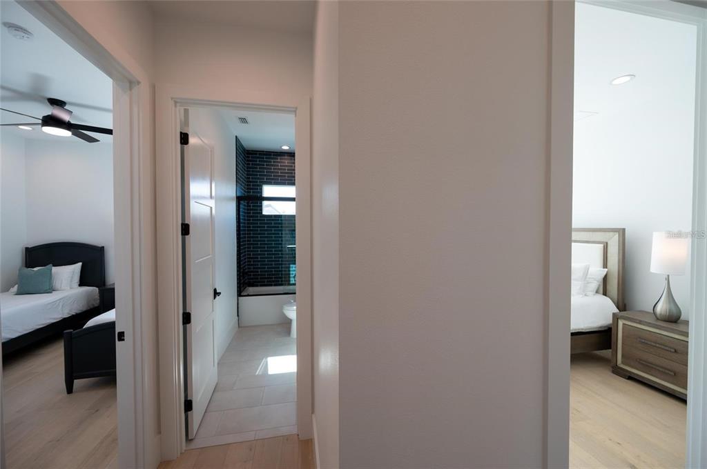 2446 Floyd Street Sarasota, FL 34239 - Photo 41 of 70 a en suite bathroom with a toilet sink and vanity