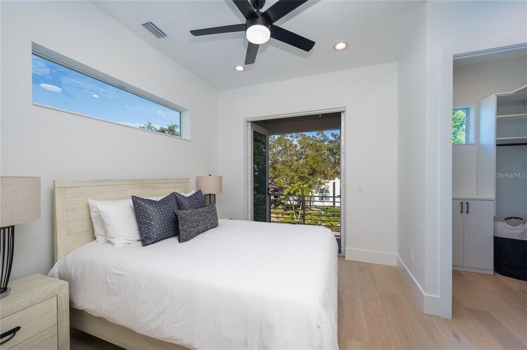 2446 Floyd Street Sarasota, FL 34239 - Photo 51 of 70 a bedroom with a bed and a window