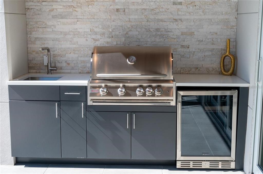 2446 Floyd Street Sarasota, FL 34239 - Photo 59 of 70 a stove top oven sitting inside of a kitchen