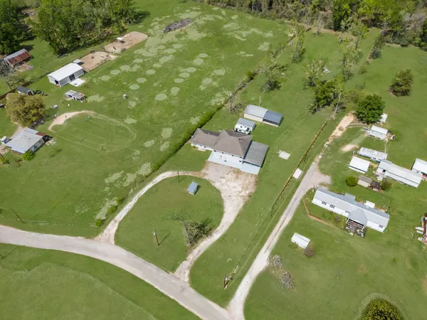 a view of a house with a big yard