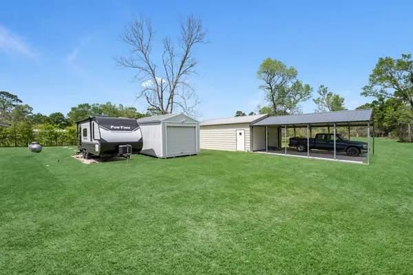 a view of a house with a big yard