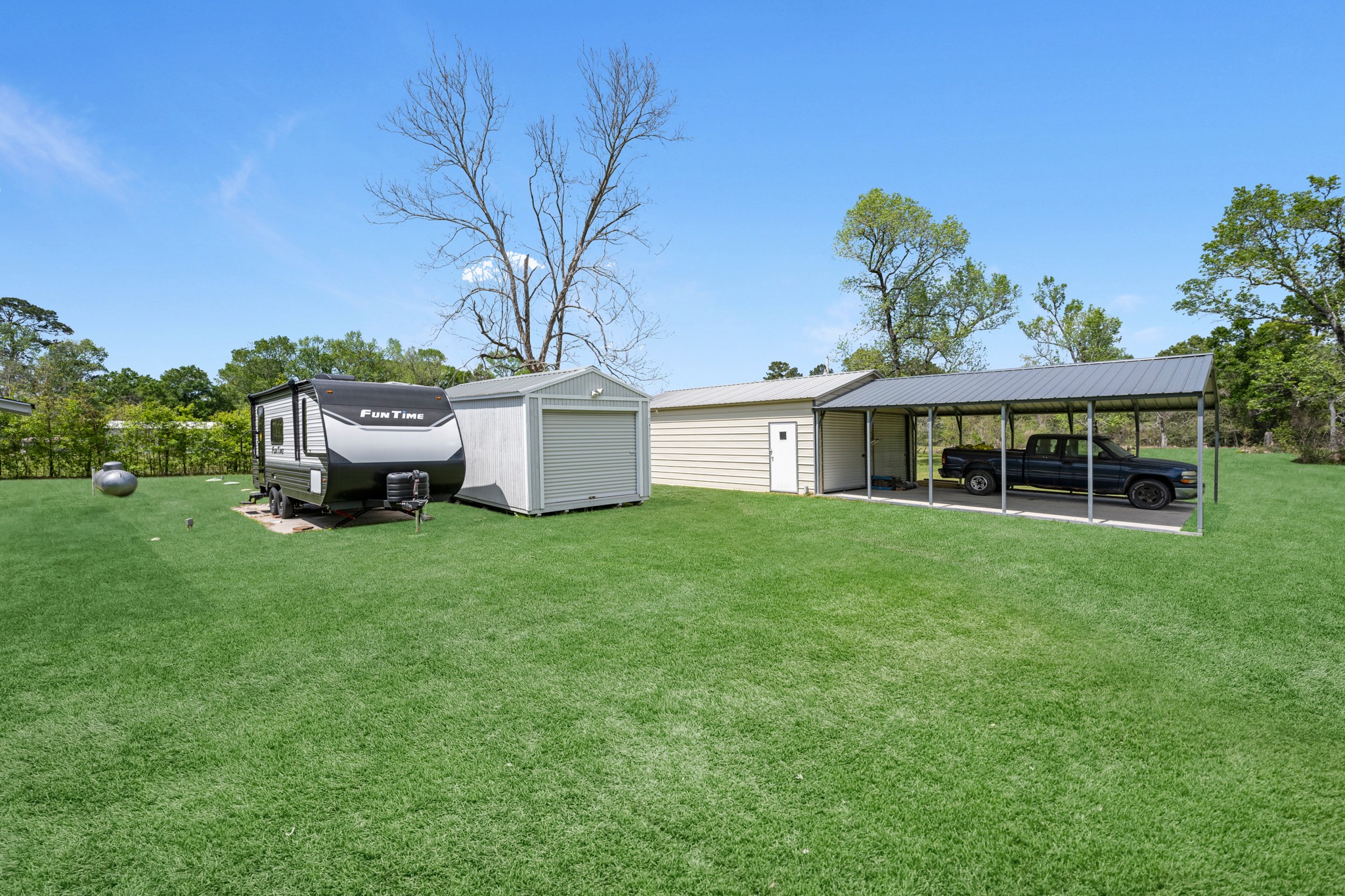 16511 Edgefield Lane Conroe, TX 77302 - Photo 36 of 42 a front view of a house with garden