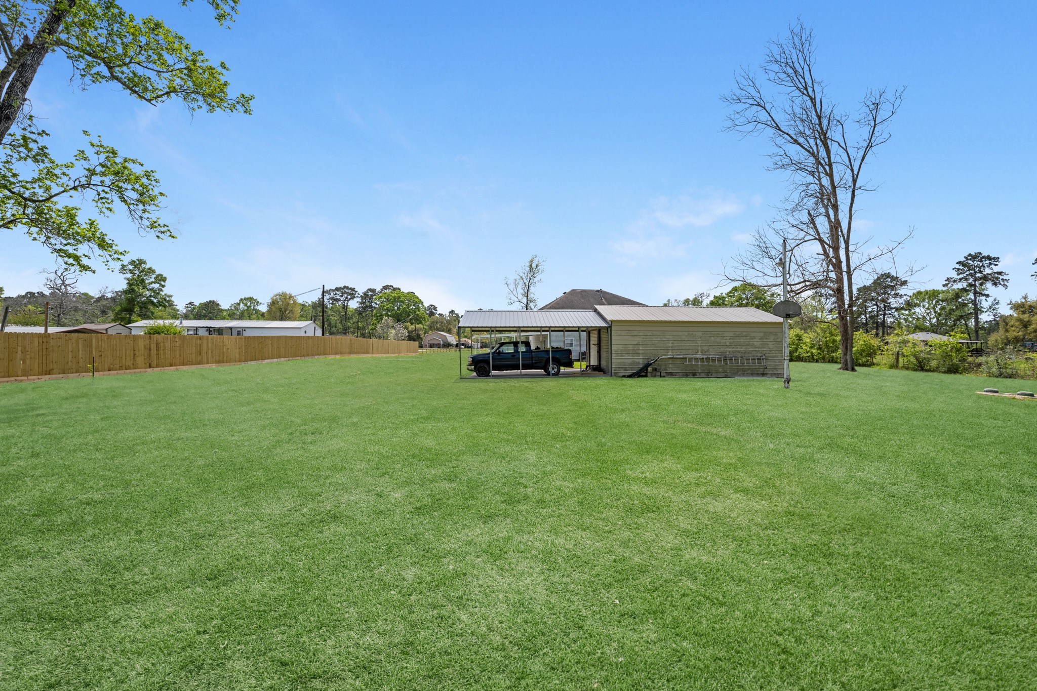 16511 Edgefield Lane Conroe, TX 77302 - Photo 38 of 42 a front view of a house with garden