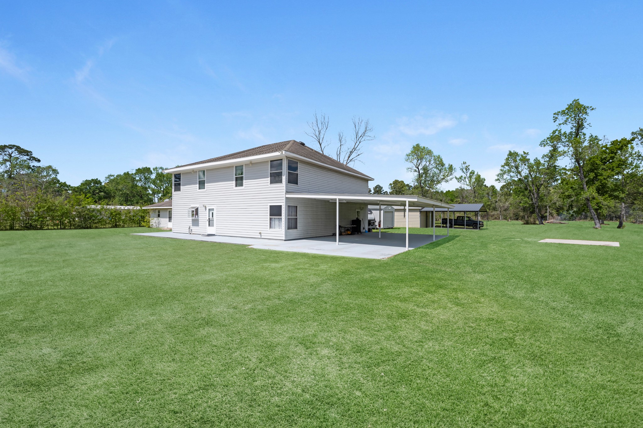 16511 Edgefield Lane Conroe, TX 77302 - Photo 39 of 42 a view of a house with a big yard