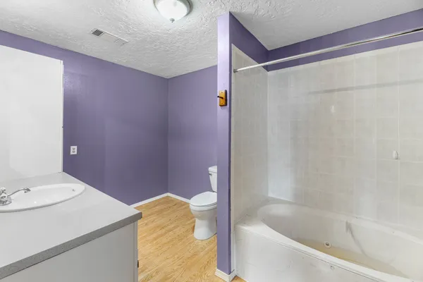 a bathroom with a sink and a bathtub