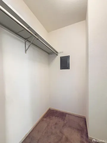 a view of a room with rack on the wall