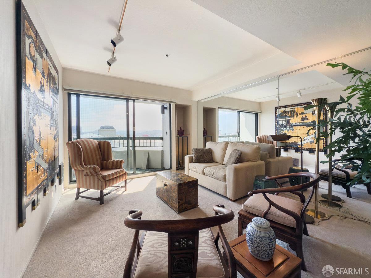 601 Van Ness Avenue, Unit 750 San Francisco, CA 94102 - Photo 3 of 37 a living room with furniture and a large window