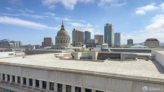 a kitchen with a sink and a dishwasher with a dining table